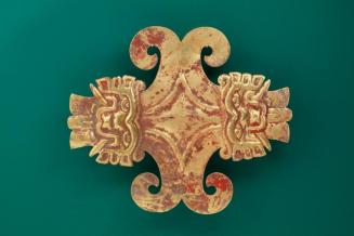 Pectoral Depicting Fanged Deity Heads