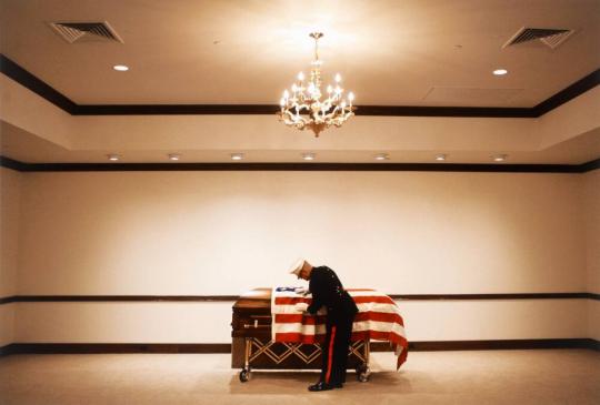 Man Draping Flag on Coffin, Nevada