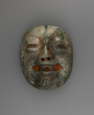 Pendant in the form of a Mask