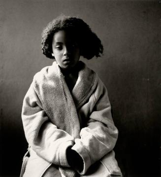 Studio Portrait of girl in house gown.