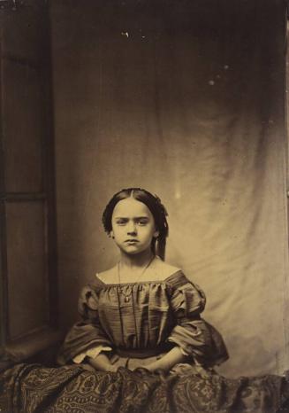 Photograph of a young girl frowning, on whom several electrophysiological experiments were proformed.