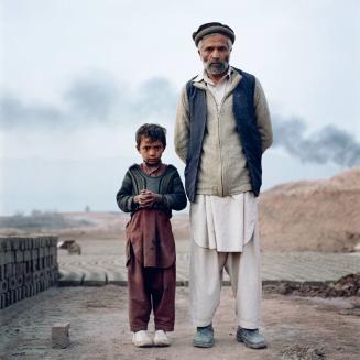 Father and son, indentured servants in a brick factory. Jalalabad, Afghanistan.