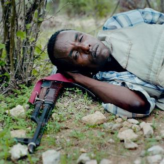 Militia member resting. Somalia.