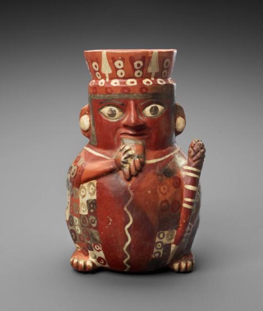 Figural Jar with Pan Pipe and Club