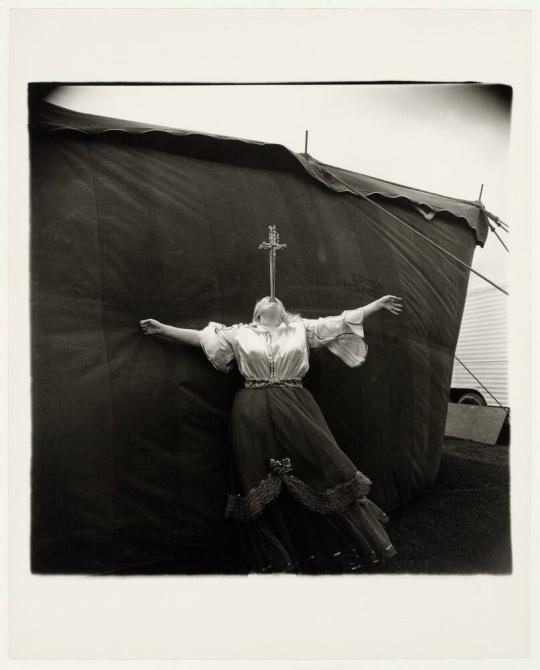 Albino sword swallower at a carnival, Md. 1970