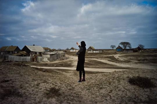 Maryam, the only young girl living on Chechen Island. Her mother, Patimat, is the island’s nurse. Her father was killed at sea, while drunk, and she lost her two brothers to cancer. She stays on the island because of her mother. Chechen Island, Dagestan, November, 2013.