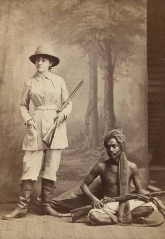 [Studio Portrait of Woman and Man Posed with Rifles]