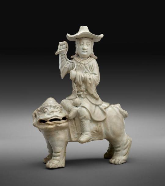 Figure of a Western Man on a Guardian Lion