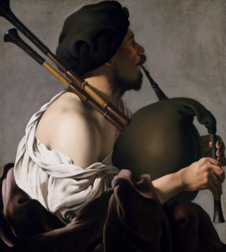 The Bagpipe Player