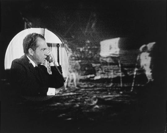 President Nixon congratulates the astronauts, Armstrong and Aldrin, on their accomplishment via telephone to the moon.