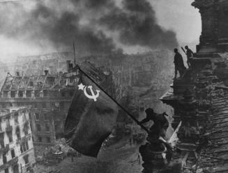 Raising the Hammer and Sickle over the Reichstag, Berlin, Germany