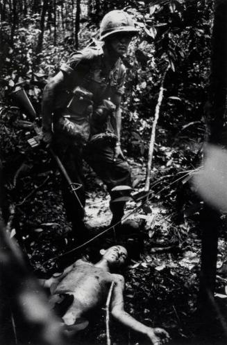 Vietcong sniper dead with airborne soldier