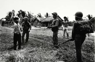 Vietcong suspect and South Vietnamese troops, Mekong Delta