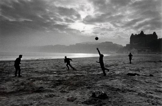 Fishermen playing during their lunch break, Scarborough, Yorkshire