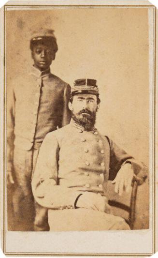 [Confederate Captain with an Enslaved Child in Uniform]