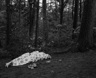 Storm approaching, couple taking cover