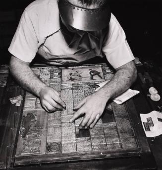 New York, New York. Composing room of the New York Times newspaper. Making up the sport page