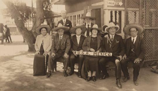 [Group wearing Sombreros, Holding a U.S.A. Mexico Sign]