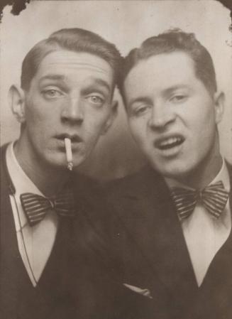 [Two Men, One with Cigarette]