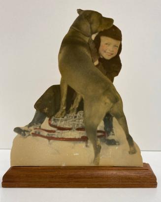 [Young Child on Sled with Dog, Handmade and colored photo statuette]