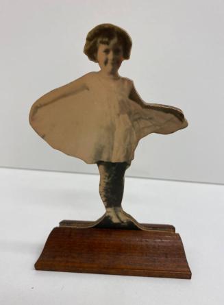 [Girl Holding Her Dress Out, Handmade and colored photo statuette]