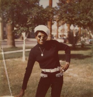 [Posed Outdoors with Beret and Sunglasses, Hand on Hip]