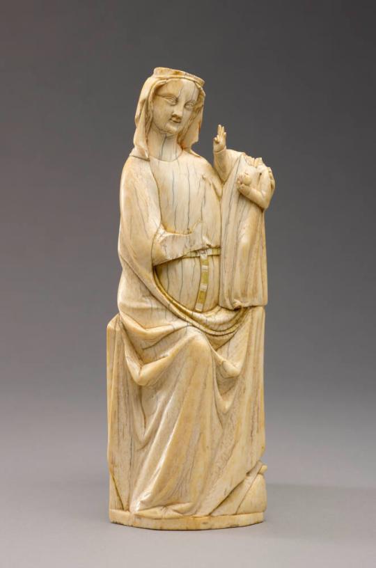 Fig. 63.2. Virgin and Child Seated, first third of the fourteenth century, elephant ivory, trac ...