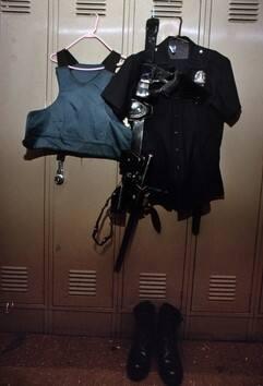 An officer's uniform hangs in the Rampart Division locker room, LAPD