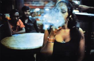 Transvestite Smoking in the Olympic Cafe, Falkland Road, Bombay, India