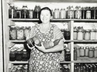 Rehabilitation client with canned goods, Chippewa County, Wisconsin