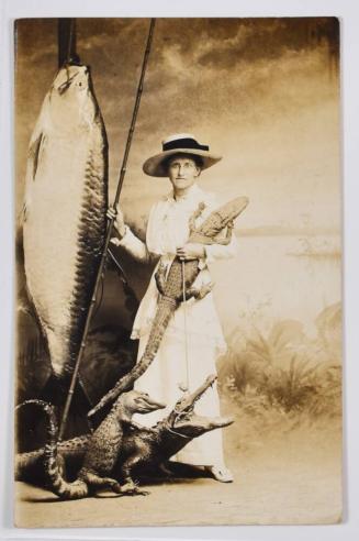 [Woman Posed with Alligators]