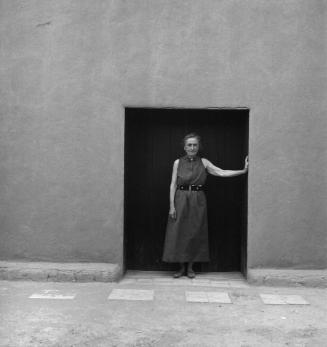 [Georgia O'Keeffe in Doorway]