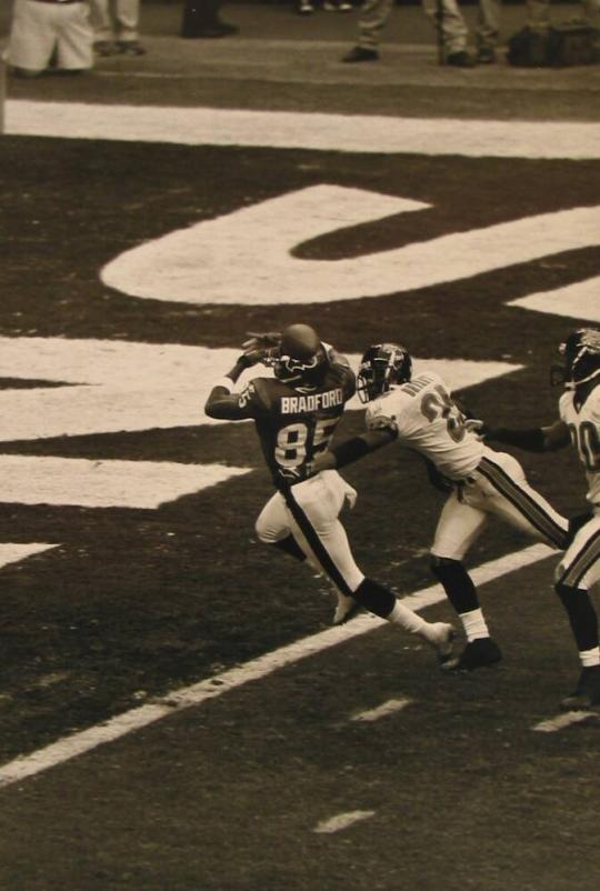 Wide Receiver Corey Bradford Attempts to Catch a Touchdown Pass in a Game against Jacksonville Jaguars, Houston, November 17, 2002