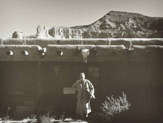[O'Keeffe at Ghost Ranch, Walking Away from House]