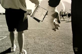 Coach Jebb Fisch with Play Flip Chart at Practice