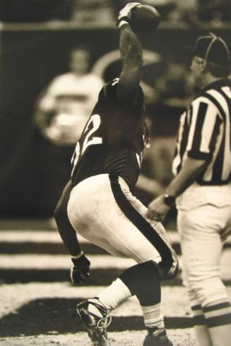 The Dallas Cowboys, in light jerseys, playing against the New York Giants,  in dark jerseys, All Works