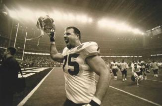 Offensive Tackle Jimmy Herndon Celebrates Victory over Dallas Cowboys, the First Win in Franchise History, Houston, September 8, 2002