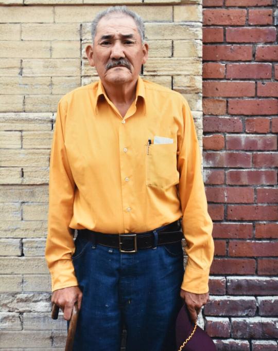 Man holding cap and cane, Downtown Man #1, Binghamton, NY