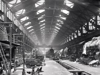 General View of Part of the Atchison, Topeka and Santa Fe Railroad Locomotive Shops During Lunch Period, Topeka, Kansas