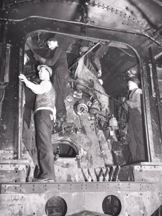 Locomotive Repair in Roundhouse at an Illinois Center Railroad Yard, Chicago, Illinois