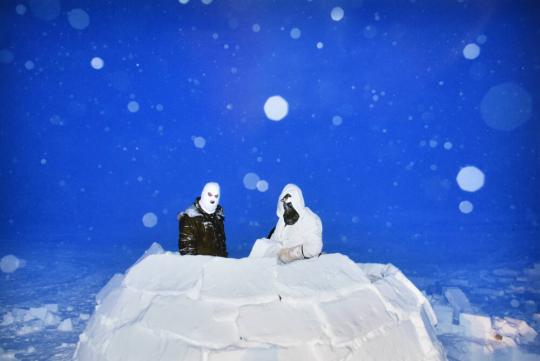 Canadian soldiers building igloos in Resolute Bay, Nunavut in Canada.