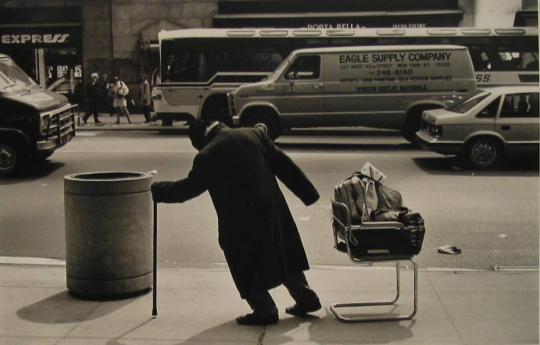 Man Pulling Chair