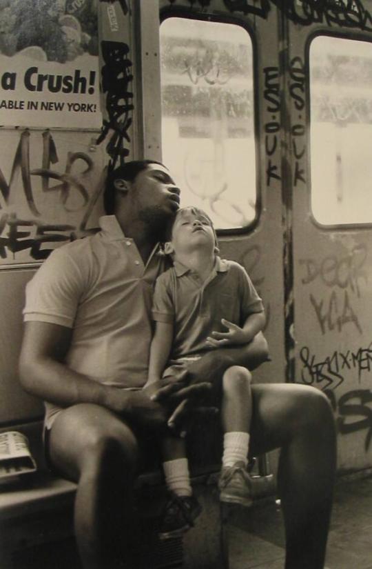 Man and Boy Sleeping on "D" Train