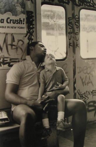 Man and Boy Sleeping on "D" Train