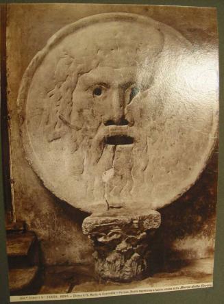 ROMA - Chiesa di S. Maria in Cosmodin - Portico.  Ruota marmorea a faccia umana detta Bocca della Verita.