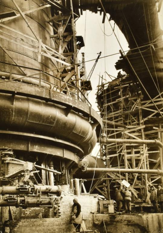 Bricklayer at Work, Blast Furnaces in Background