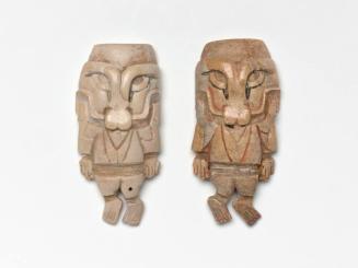 Pair of Deity Effigy Ornaments