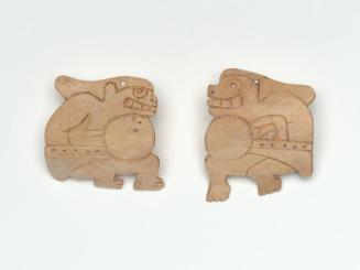 Pair of Plaques with a Crouching Figure