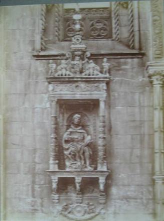 Facade of the Cathedral. Tabernacle with the statue of Plinio.