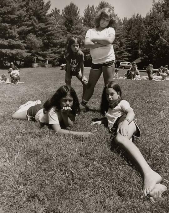 4 girls on lawn at Camp Pinecliffe, Harrison, Maine
